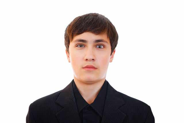 A teenager with an eye twitch.