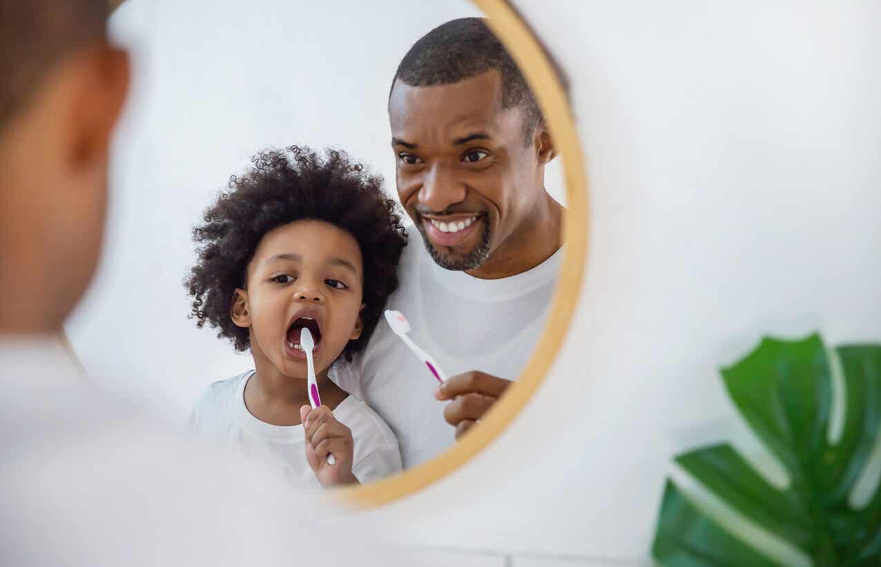 Dad brushing his teeth.