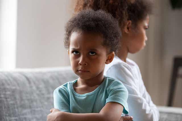 Two girls mad at each other.