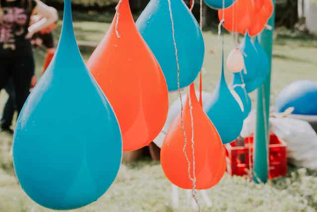 Water balloons hanging outside.