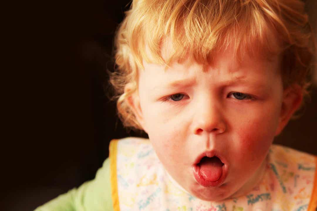 A baby coughing.