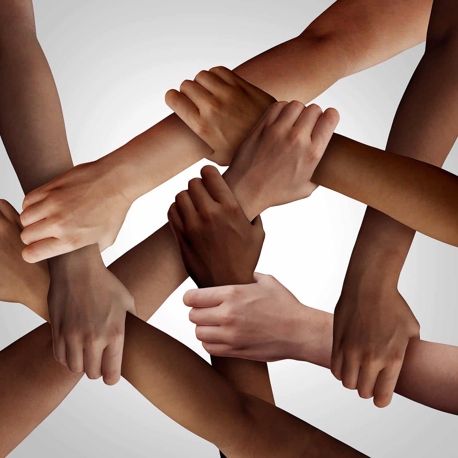 Arms of different races intertwined to represent human rights.