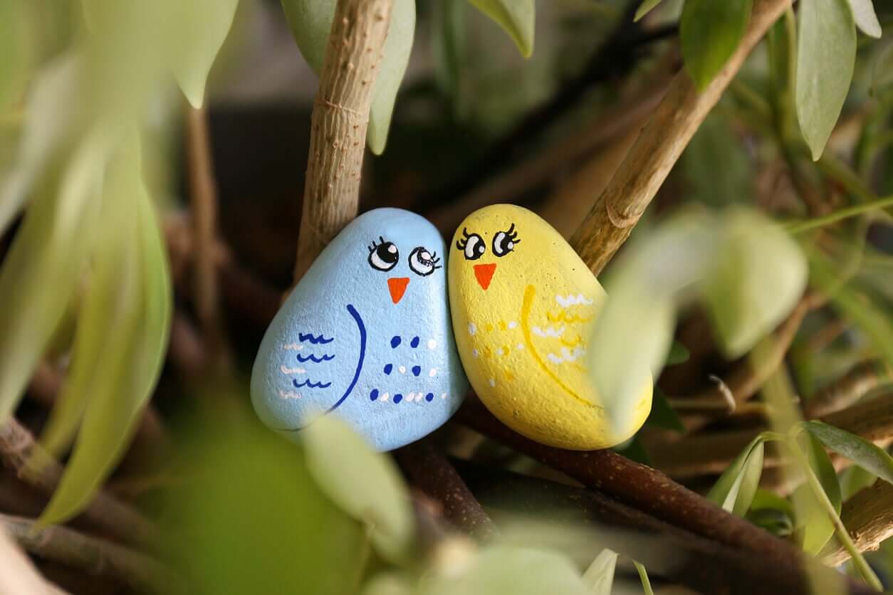 Stones painted like birds.