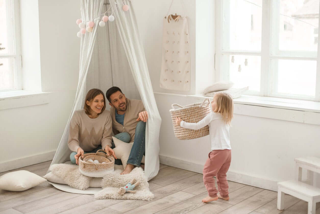 A family playing in their relaxing corner.