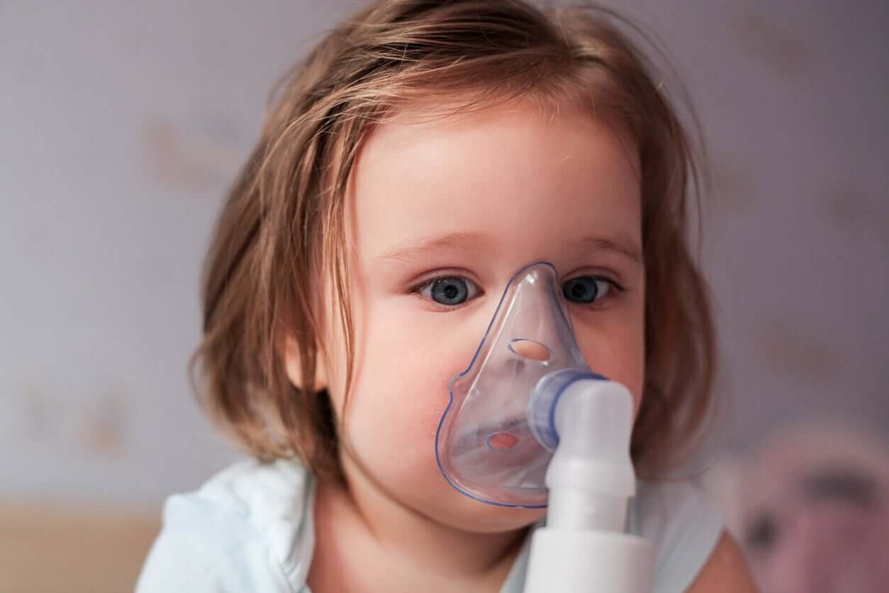 A baby using a nebulizer.