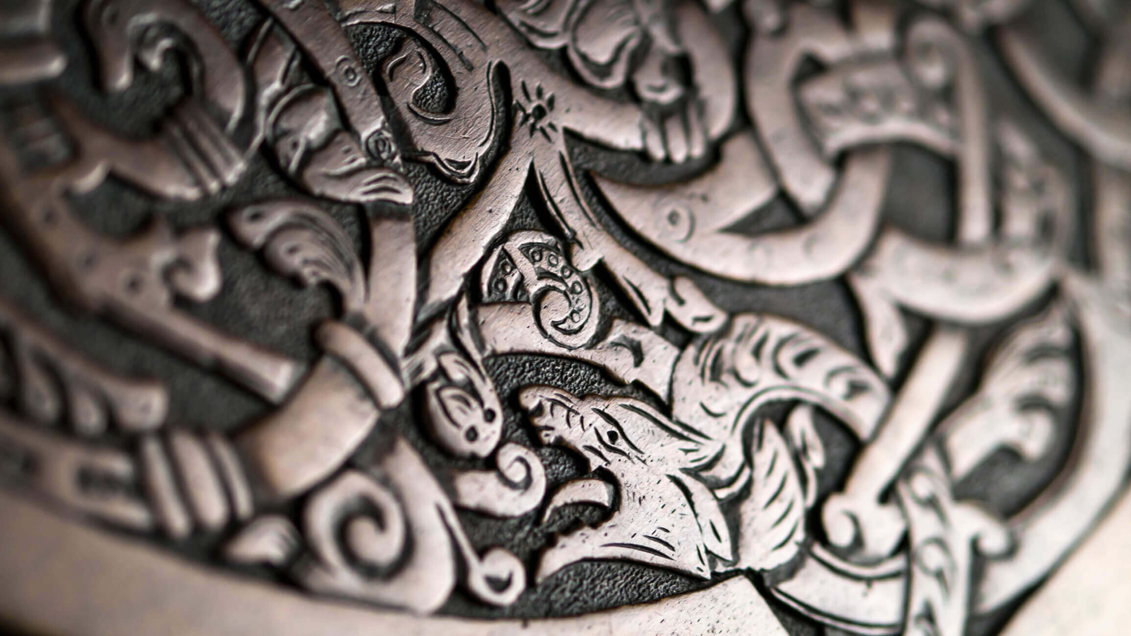 A Celtic carving in silver.