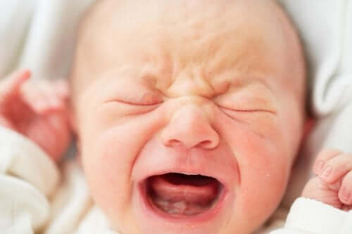 A crying newborn.