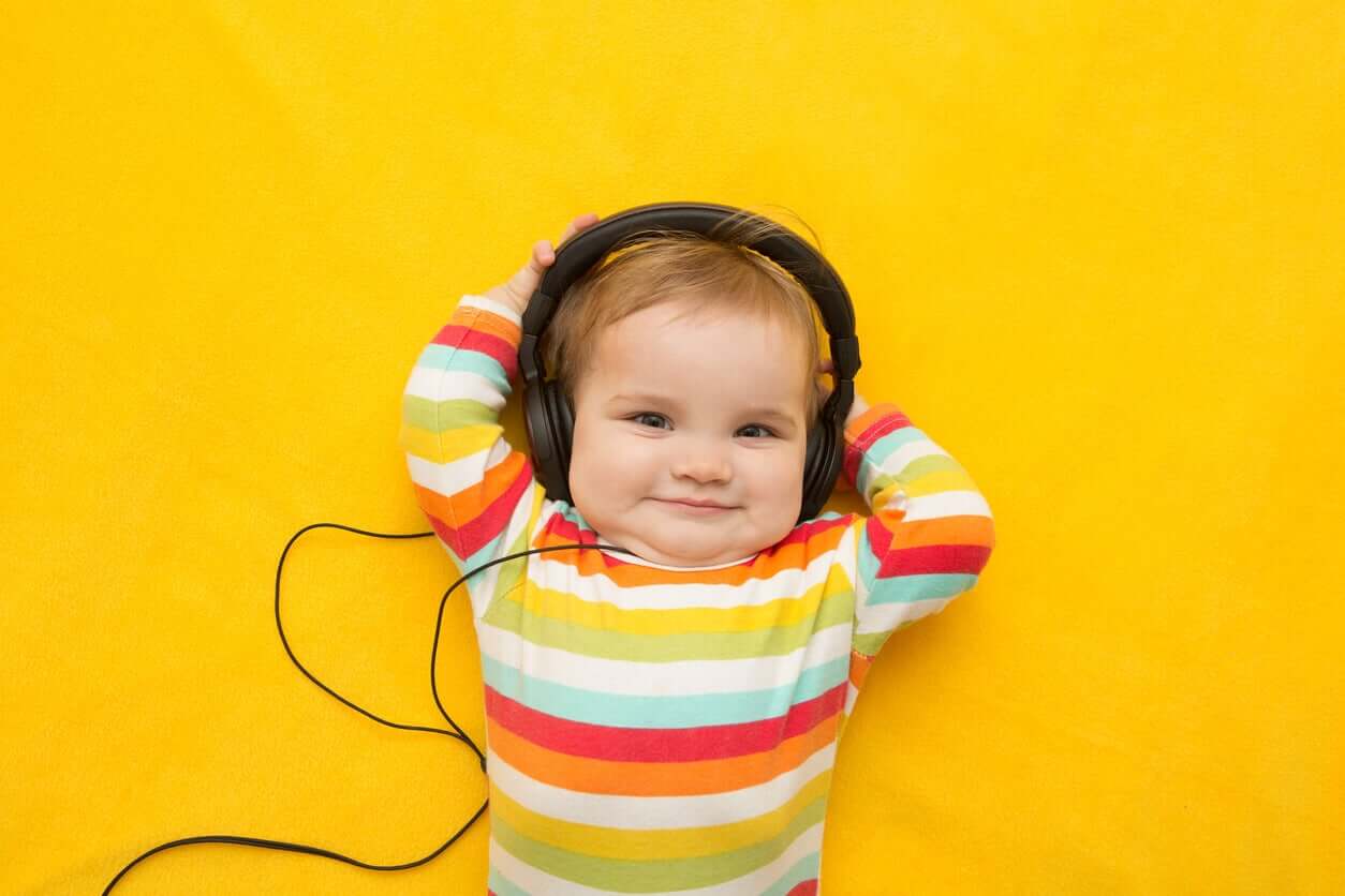 A baby boy wearing headphones.