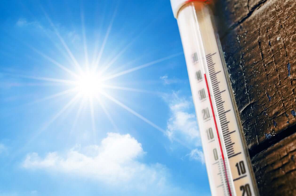 A thermometer on a hot summer day.