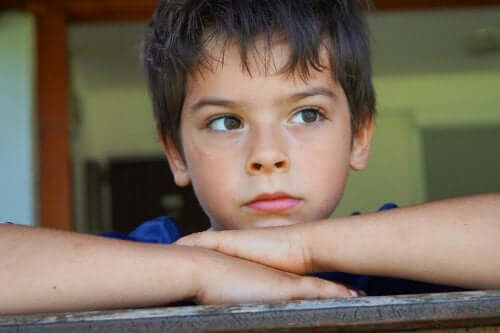 A young boy thinking.