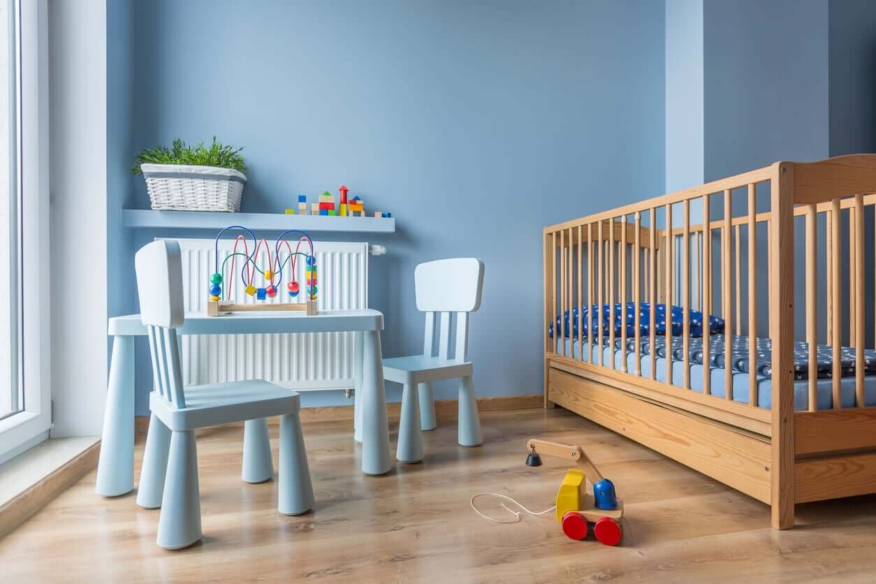 A baby's room decorated in light blue.