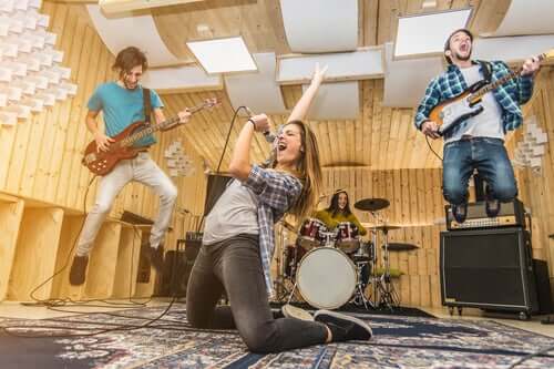 Teenagers playing in a band.