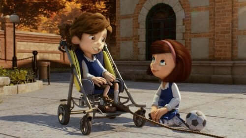 Maria sitting on the ground looking up at her friend and smiling.