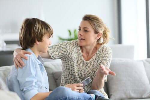 A mother talking with her pre-teen son.