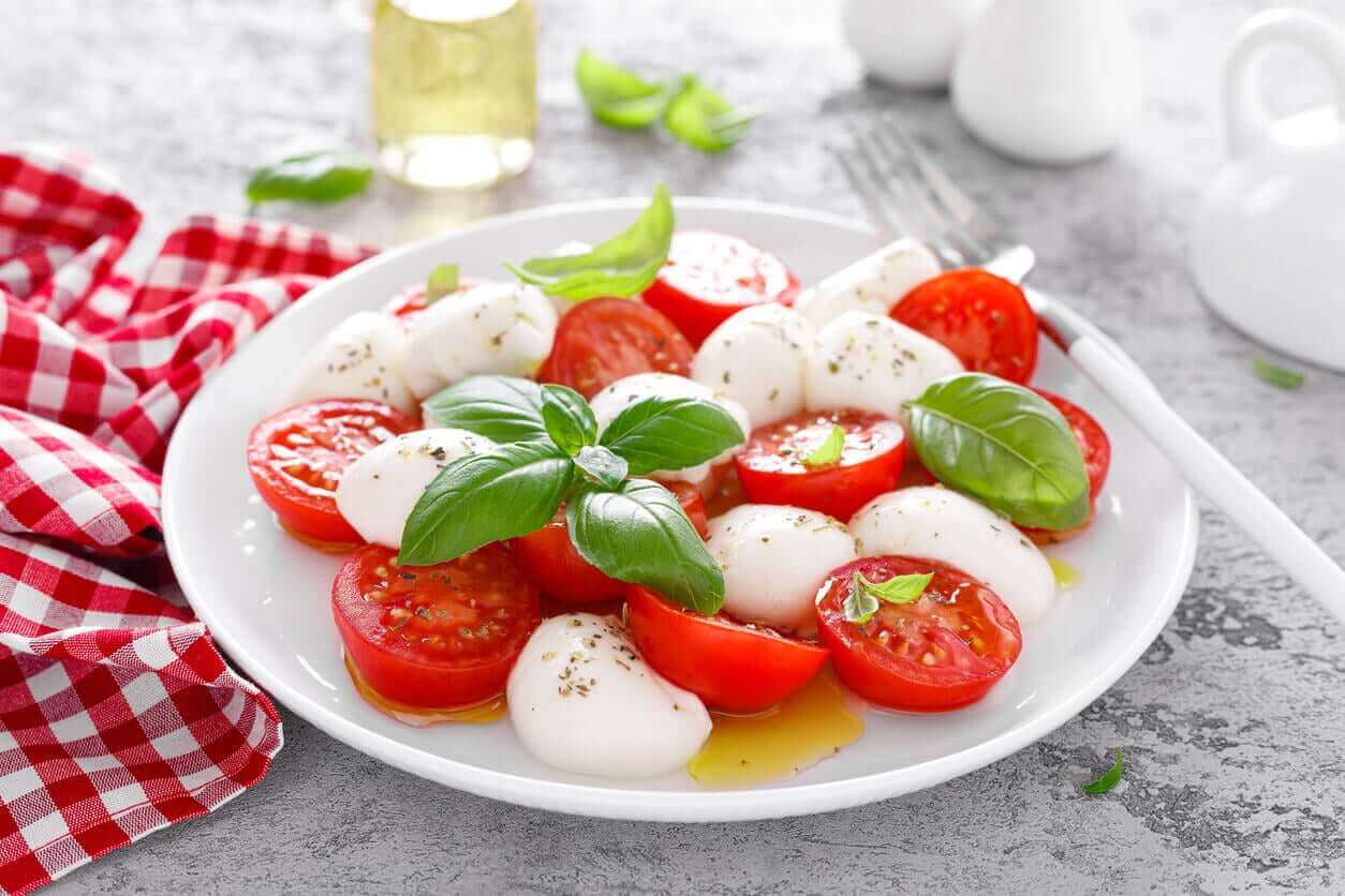 A capresse salad with tomato, mozzarella, and basil.