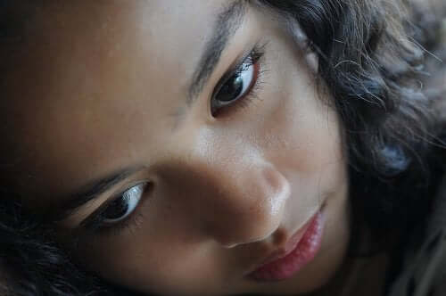 A young girl with a blank stare.
