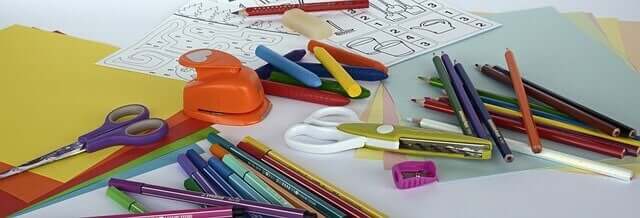 Markers, crayons, colored pencils, and other craft supplies.