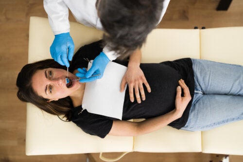 A pregnant woman at the dentist.