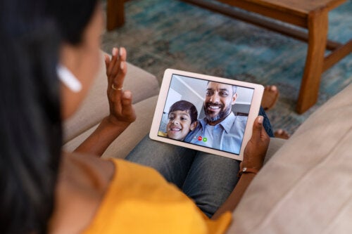 A mother practicing long-distance parenting.