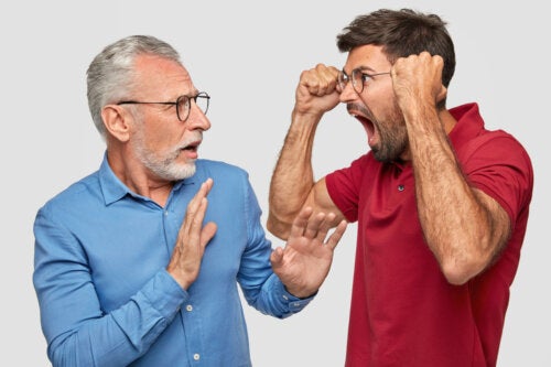 A grandfather and father having an argument.