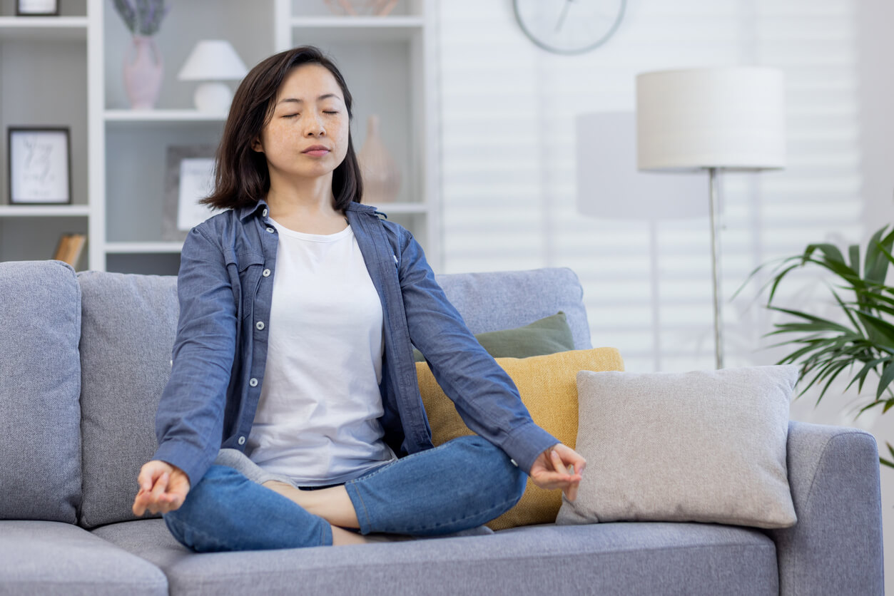 A woman practicing yoga.